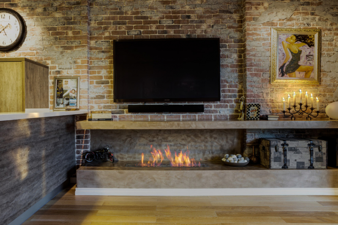 intérieur de style loft avec cheminée