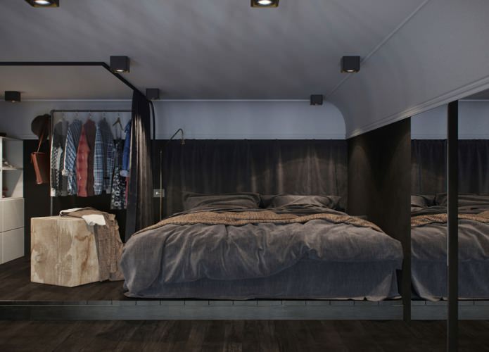 intérieur de chambre dans un studio avec de hauts plafonds