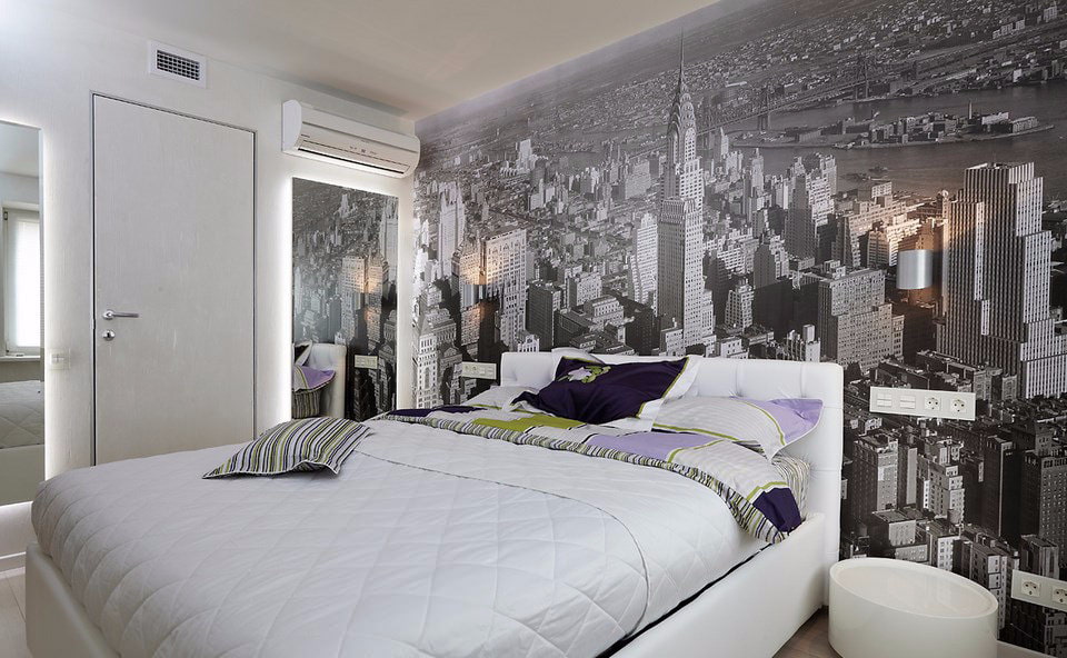 Des photos murales grises dans la chambre