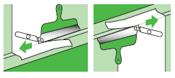 couper l'excès de papier peint avec une spatule en métal