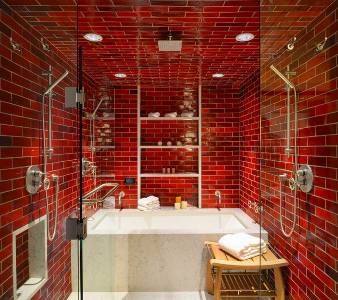 salle de bain fini avec des carreaux rouges