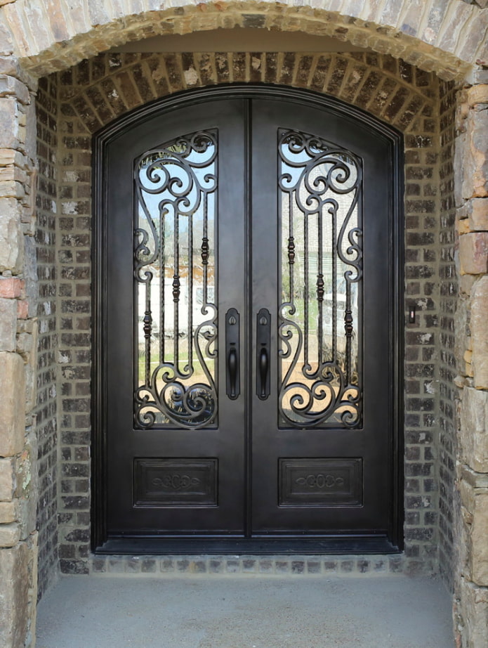 porte d'entrée en fer forgé et verre