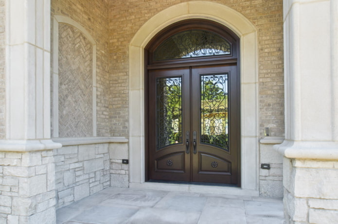 porte d'entrée en fer forgé et verre