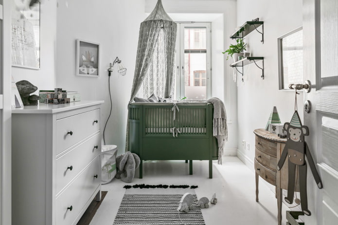 berceau vert pour bébé à l'intérieur