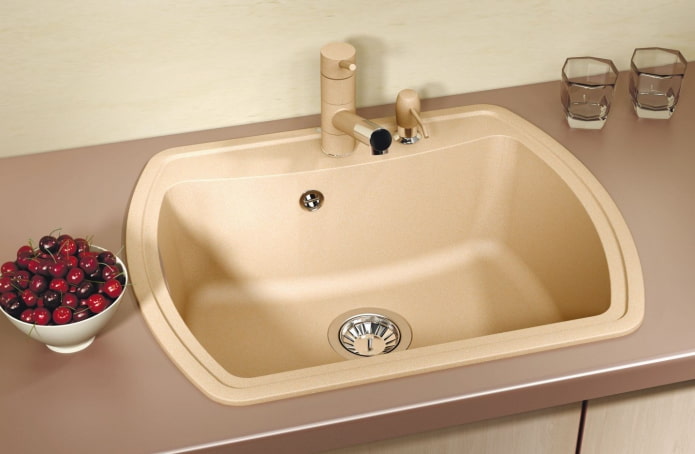 beige sink na gawa sa artipisyal na bato sa interior