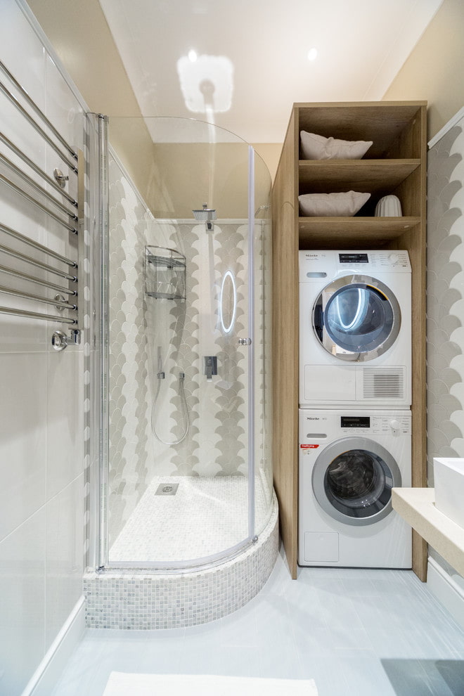 Salle de douche avec meuble pour machine à laver