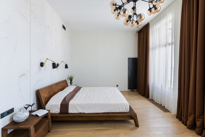 intérieur de la chambre dans les tons blancs et marron