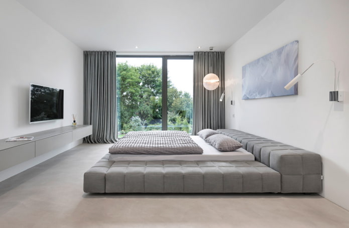 intérieur de la chambre dans les tons blancs et gris