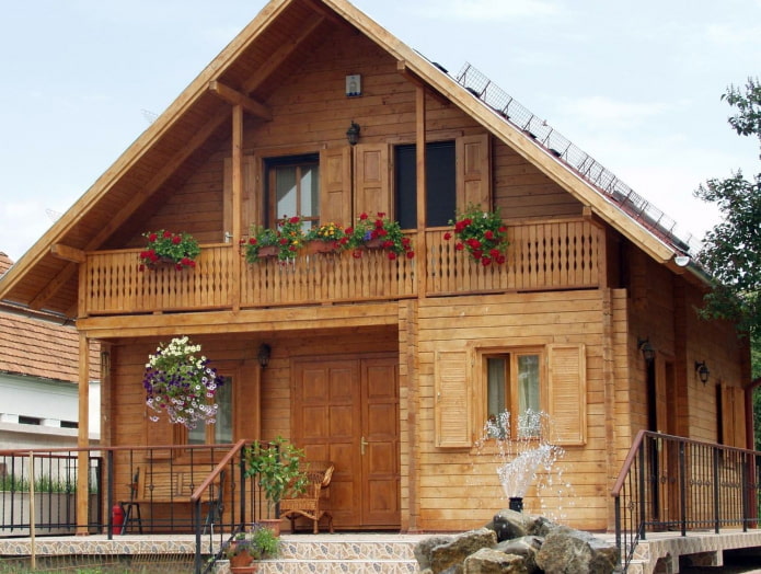 projet d'une maison en bois avec balcon