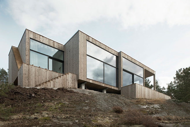 Maison sur les pentes des montagnes